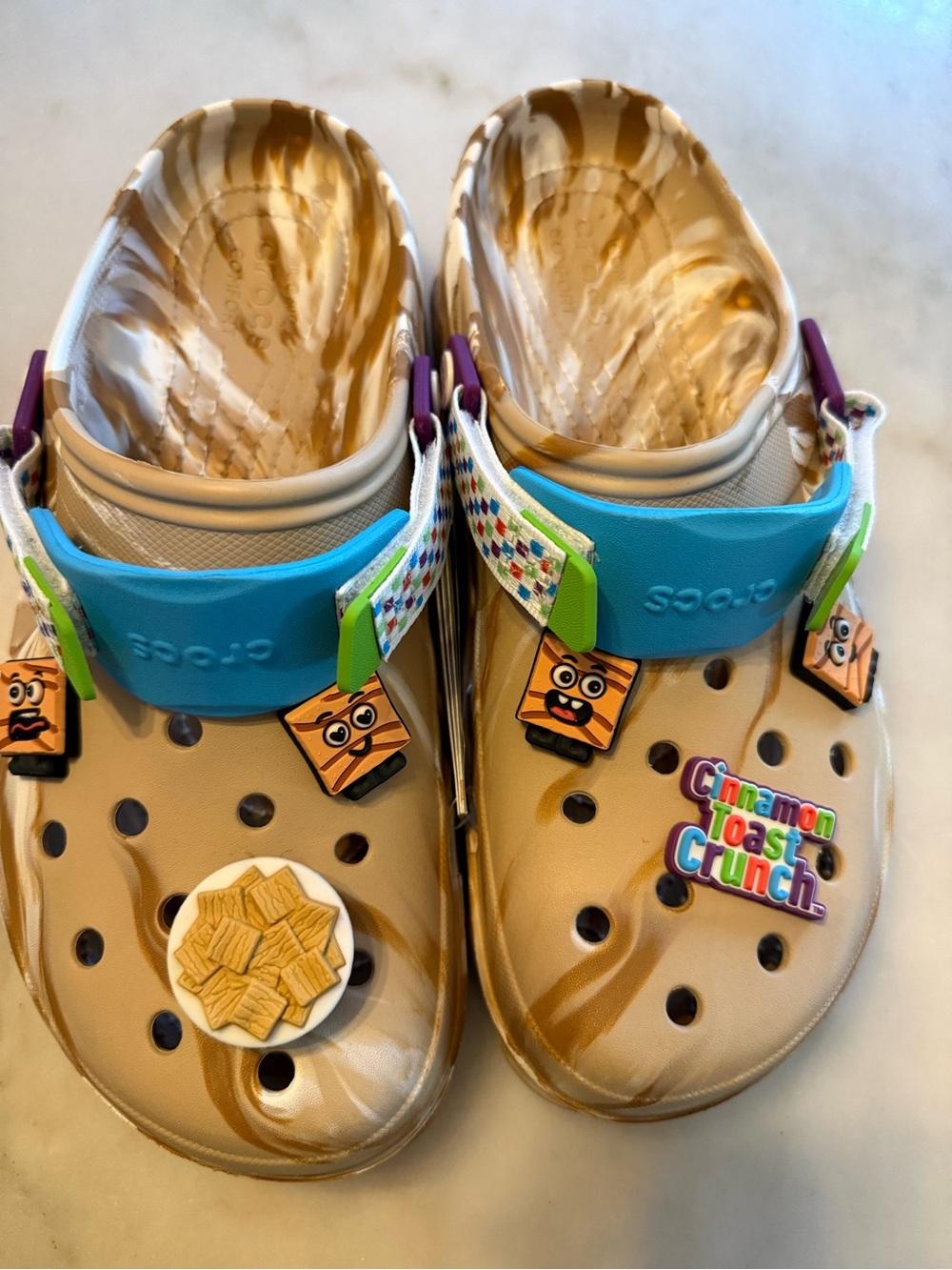CROCS Beige Marbled Clog with Bright Blue Strap and Multicolor Charms